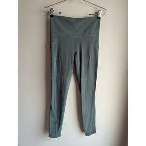 Athleta Salutation Stash Pocket II Tight // Peat Green // Size Small